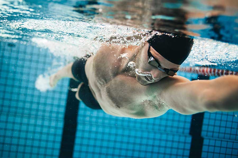 Man swimming under water