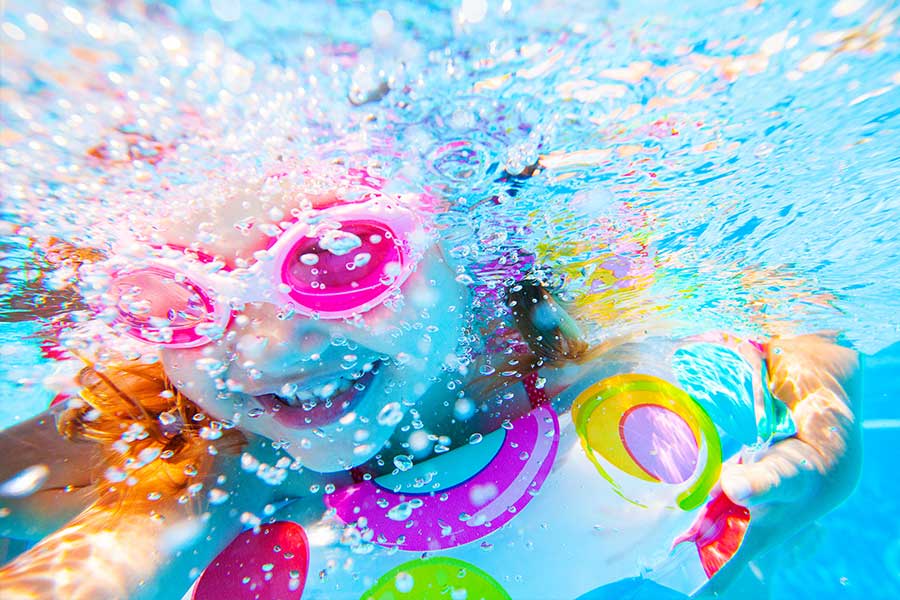 Young Girl Swimming Under Water